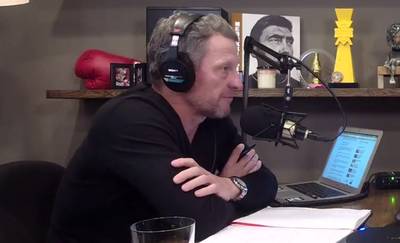 Armstrong neemt het op voor Froome