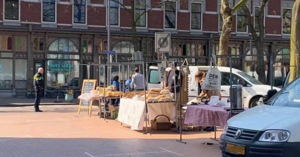 Toch een buitenmarkt op het Deliplein in #Rotterdam, politie grijpt in.