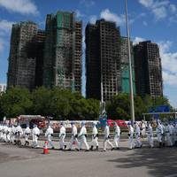 ‘Vriendelijk doch dringend verzocht te vertrekken’: hoe politie in Hongkong hulpposten na verwoestende brand sluit