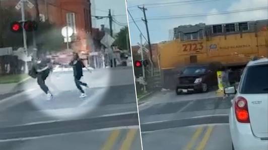 Moeder en dochter ontsnappen nipt van aanrijdende trein en lopen hand in hand weg