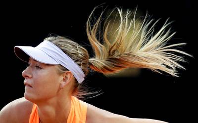 Sjarapova mist grastoernooien wegens blessure