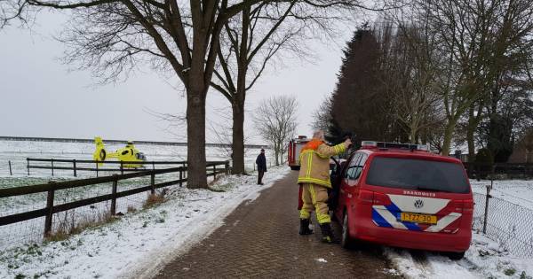 Man bekneld onder hooibalen in Overasselt