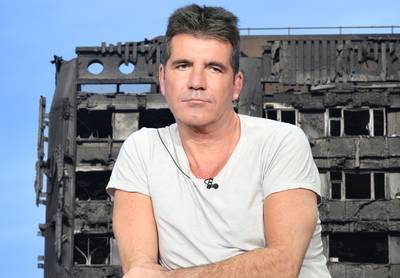 Simon Cowell regelt sterren voor benefietlied Grenfell Tower