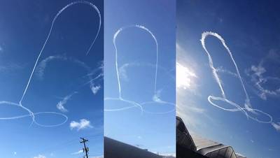 Marinevlieger tekent mannelijk geslachtsdeel in de lucht